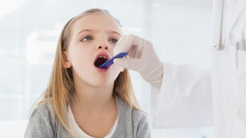 At what age is tonsil surgery recommended?