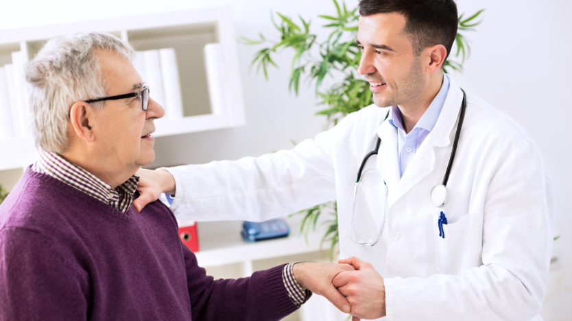 Doctor and patient chatting in a doctor's office