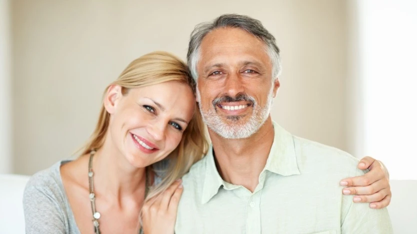 Couple smiling  to the camera