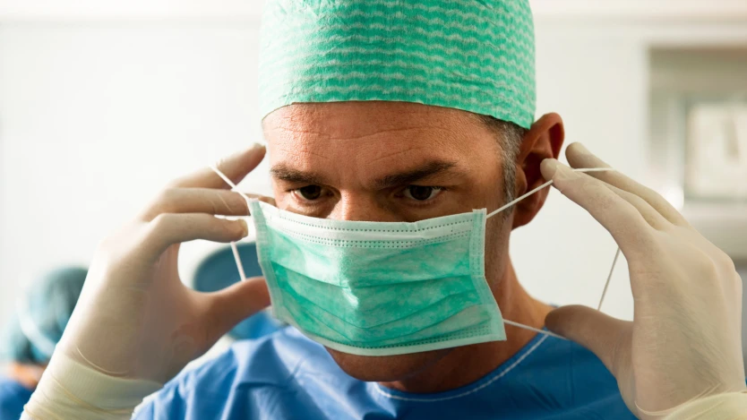 Surgeon preparing himself to go into the operating room