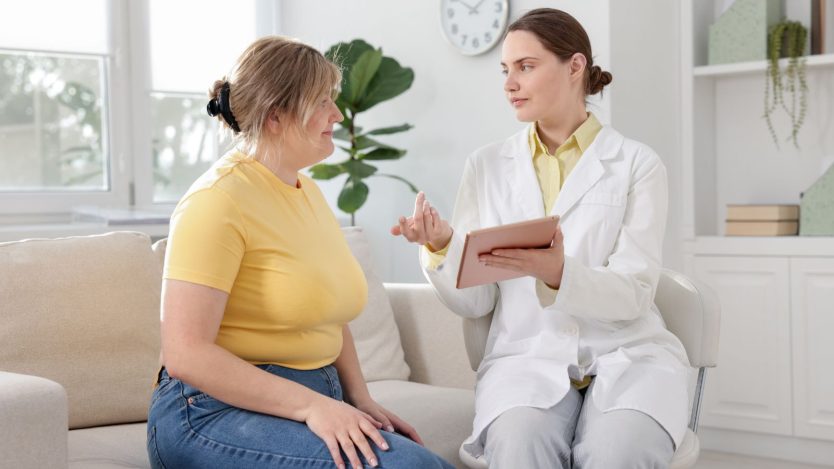 Patient with obesity problems in consultation with a doctor