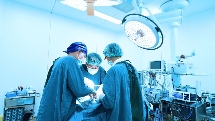 Surgeons performing bunion surgery