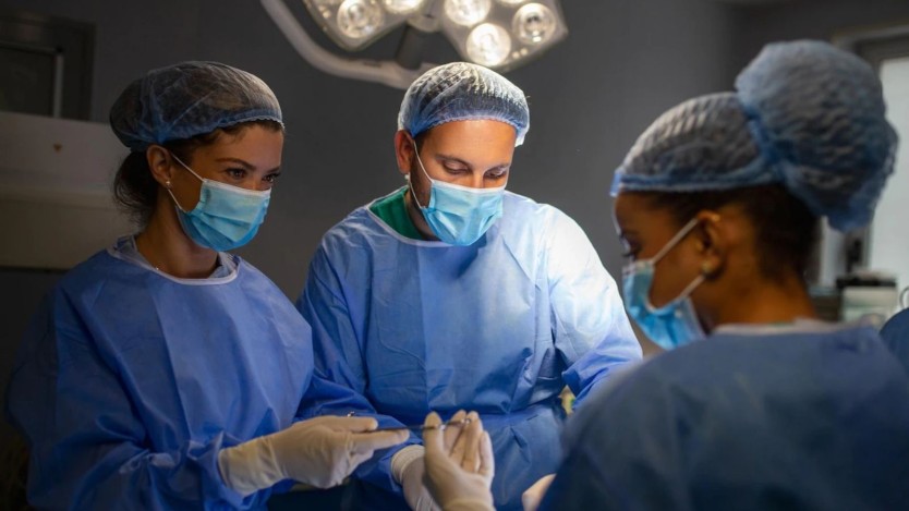 Surgeons performing a surgical intervention